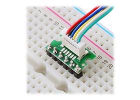 Breakout for JST SH-Style Connector, 6-Pin Male Top-Entry in a breadboard.